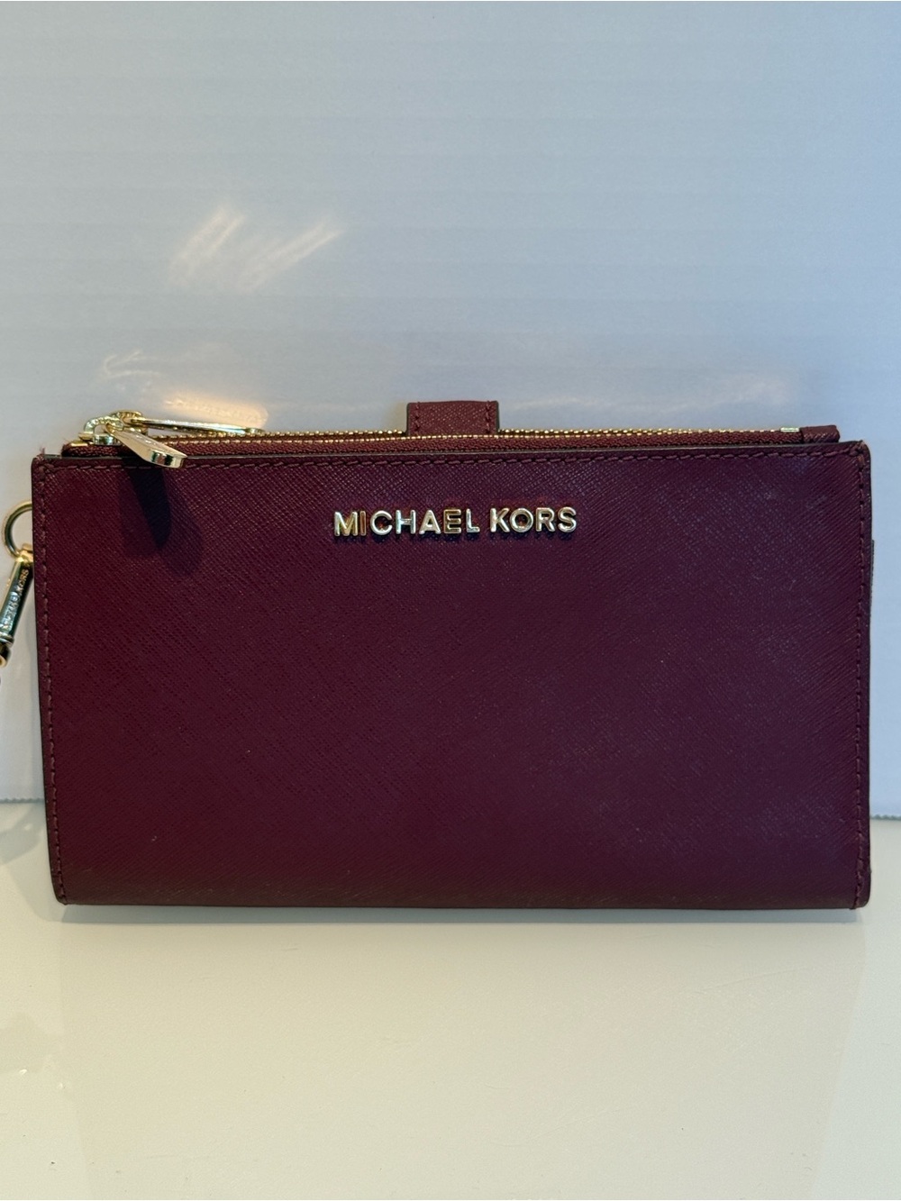Michael Kors Burgundy Leather Wristlet with Gold Hardware